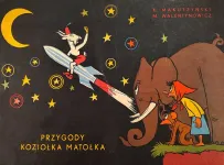 Okładka komiksu &quot;Przygody Koziołka Matołka&quot;, na której Koziołek Matołek leci rakietą do gwiazd.